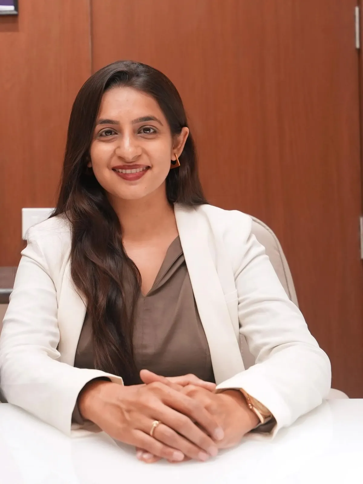 Dr. Pooja Shah, MDS Endodontist and Root Canal Specialist at Aurum Dental Clinic, Vadodara