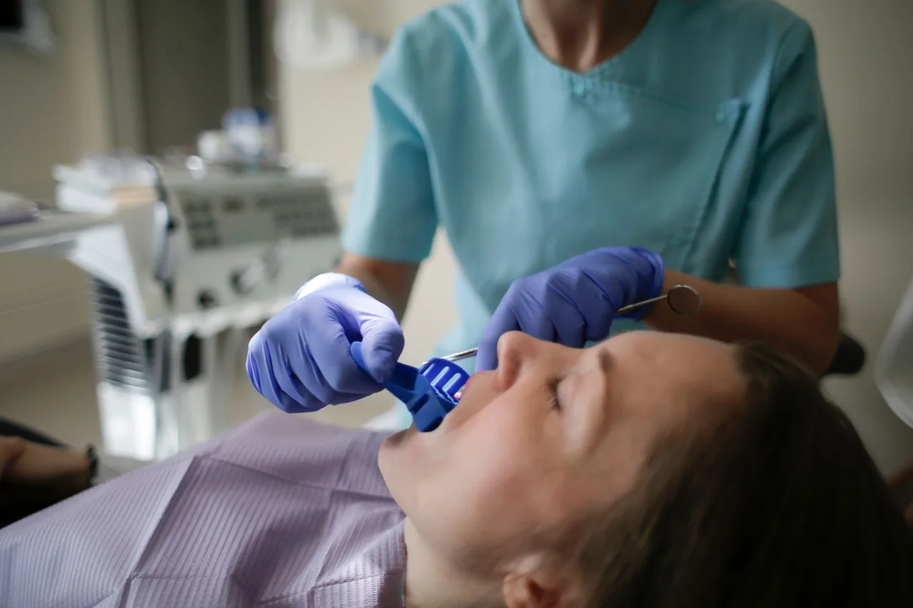 Clinician carrying out tmj pain at Aurum Dental Clinic